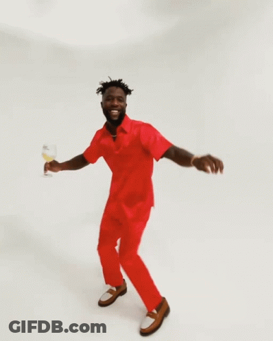 Man In Red Shirt Holding Champagne Glass GIF