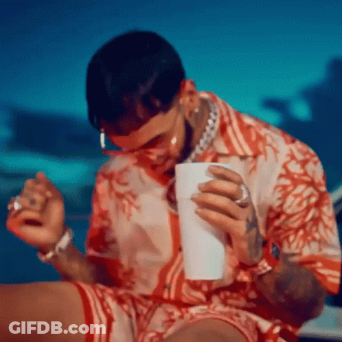 Man In Red Shirt Holding Cup And Cigarette GIF