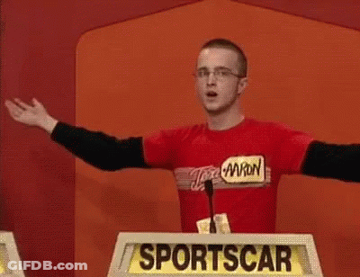 Man In Red Shirt Holding Head GIF