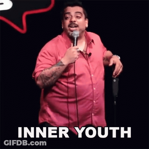 Man In Red Shirt Holding Microphone Inner Youth GIF