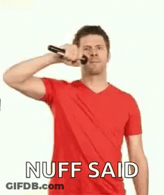 Man In Red Shirt Holding Microphone Saying Nuff Said GIF