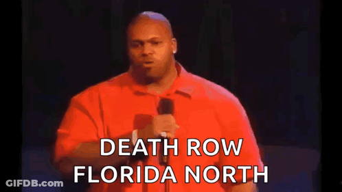 Man In Red Shirt Holding Microphone Talking About Death Row Florida North GIF