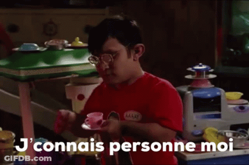 Man In Red Shirt Holding Tea At Toy Kitchen GIF