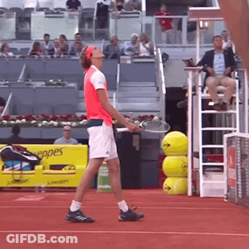 Man In Red Shirt Holding Tennis Racket GIF