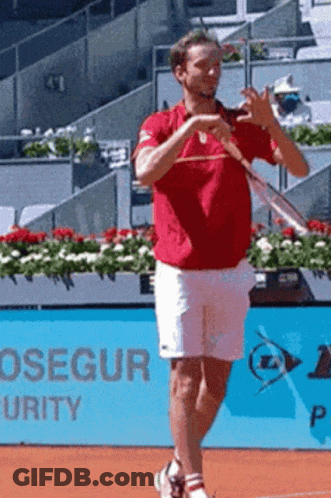 Man In Red Shirt Holding Tennis Racquet GIF