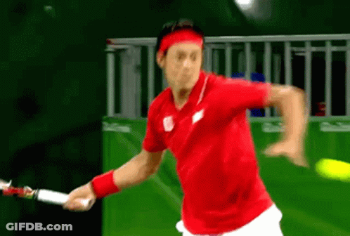 Man In Red Shirt Holding Tennis Racquet GIF