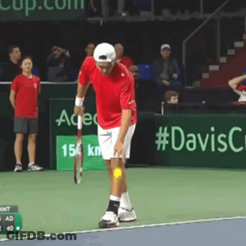 Man In Red Shirt Holding Tennis Racquet GIF