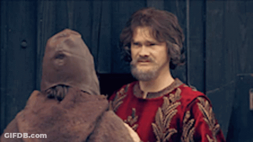 Man In Red Shirt In Front Of Joke That I'm Sign GIF