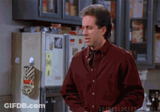 Man In Red Shirt In Front Of Refrigerator GIF