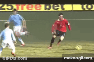 Man In Red Shirt Kicking Soccer Ball GIF