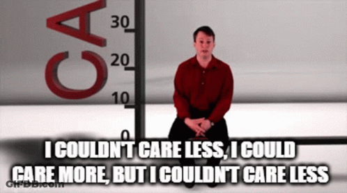 Man In Red Shirt Kneeling In Front Of Scale Ca 30 GIF