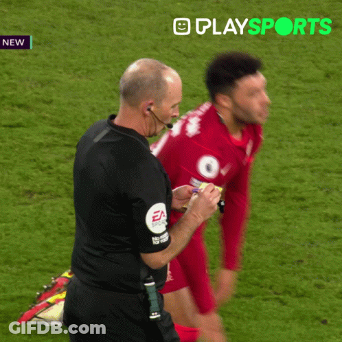 Man In Red Shirt Kneeling Next To Man In Black Shirt EA Sports GIF
