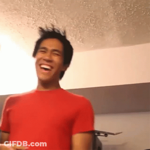 Man In Red Shirt Laughing With Skateboard GIF