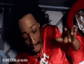 Man In Red Shirt Laying On Bed GIF