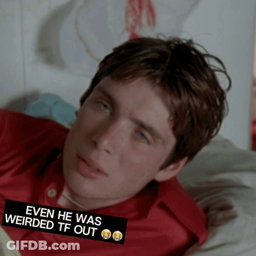 Man In Red Shirt Lying On Bed GIF