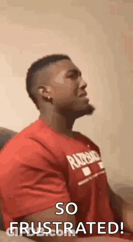 Man In Red Shirt Making Face GIF