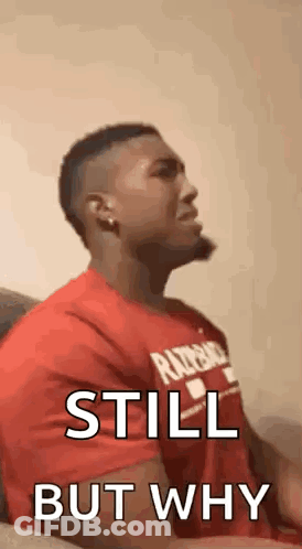 Man In Red Shirt Making Face On Couch GIF