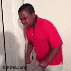 Man In Red Shirt Making Funny Face GIF