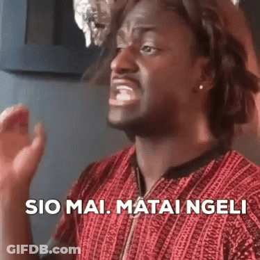 Man In Red Shirt Making Funny Face Saying Sio Mai Matai Ngeli GIF