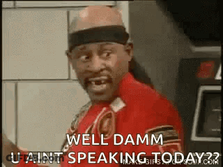 Man In Red Shirt Making Funny Face Talking GIF