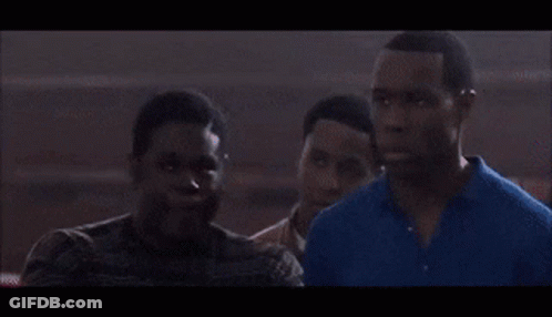 Man In Red Shirt Making Funny Face GIF