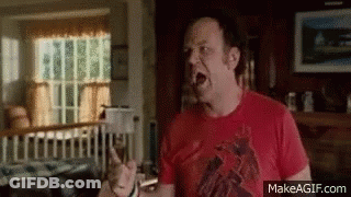 Man In Red Shirt Making Funny Face GIF