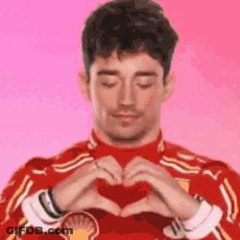 Man In Red Shirt Making Heart GIF