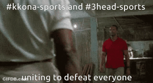 Man In Red Shirt Next To Man In White Shirt GIF
