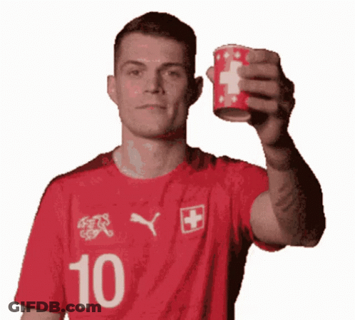 Man In Red Shirt Number 10 Holding Cup GIF
