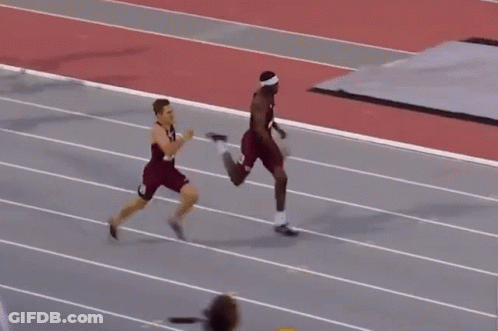 Man In Red Shirt Number 14 Falling On Track GIF