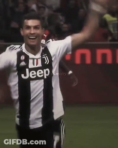 Man In Red Shirt Number 7 Jumping On Soccer Field GIF