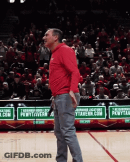 Man In Red Shirt On Basketball Court In Front Of PkwyTavern.com Sign GIF