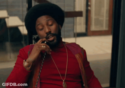 Man In Red Shirt On Phone GIF
