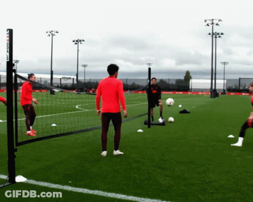 Man In Red Shirt On Soccer Field Saying Soccer GIF