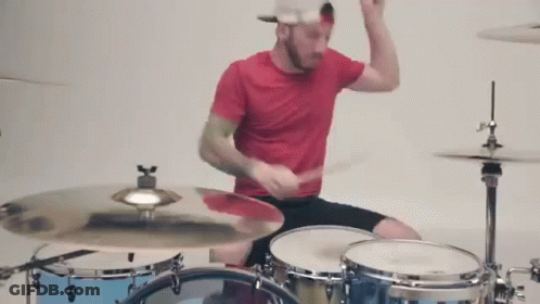 Man In Red Shirt Playing Drums GIF