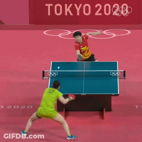 Man In Red Shirt Playing Ping Pong GIF