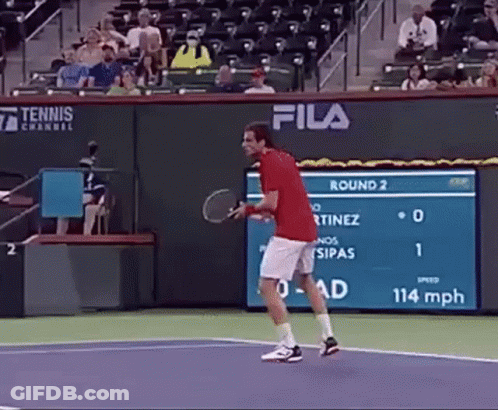 Man In Red Shirt Playing Tennis GIF