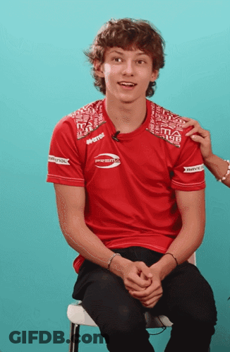 Man In Red Shirt Prestige Sitting On Chair GIF