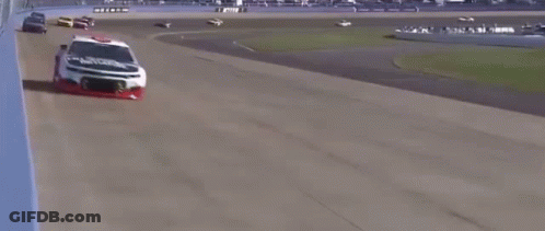 Man In Red Shirt Riding Skateboard GIF