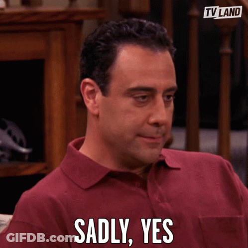 Man In Red Shirt Sadly Says Yes In Front Of TV Land Logo GIF