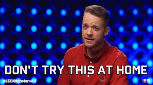 Man In Red Shirt Saying Don't Try This At Home GIF