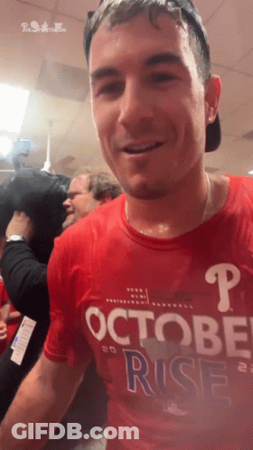 Man In Red Shirt Saying October Rise GIF