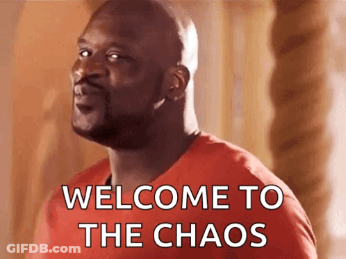 Man In Red Shirt Saying Welcome To Chaos GIF