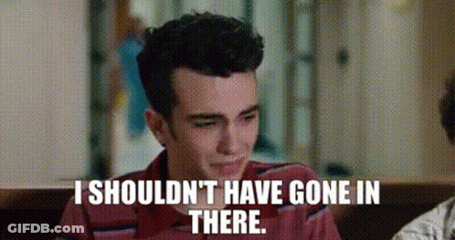 Man In Red Shirt Sitting At Table With Quote GIF