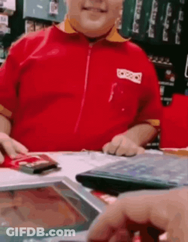 Man In Red Shirt Sitting At Tablet GIF