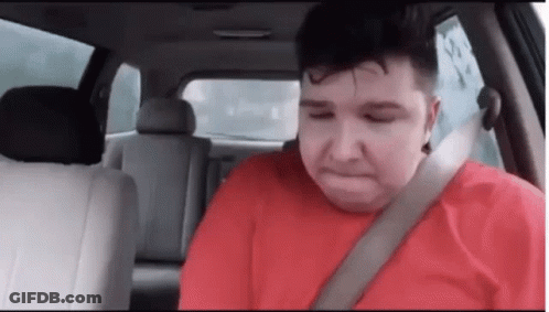 Man In Red Shirt Sitting In Car GIF