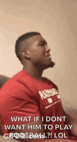 Man In Red Shirt Sitting On Couch Talking GIF