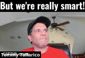 Man In Red Shirt Sitting With Caption But We're Really Smart Tommy Tallarico GIF