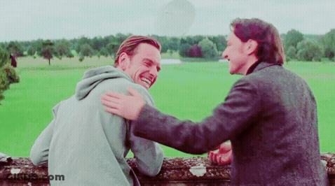 Man In Red Shirt Sitting With Make It Snow On Face GIF