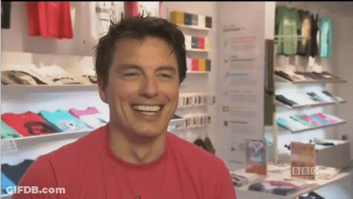Man In Red Shirt Smiling GIF